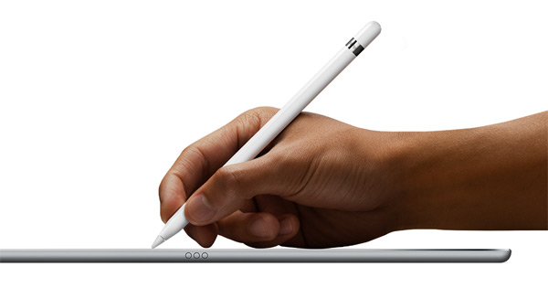 Image of Apple Pencil being used with iPad Pro on flat surface