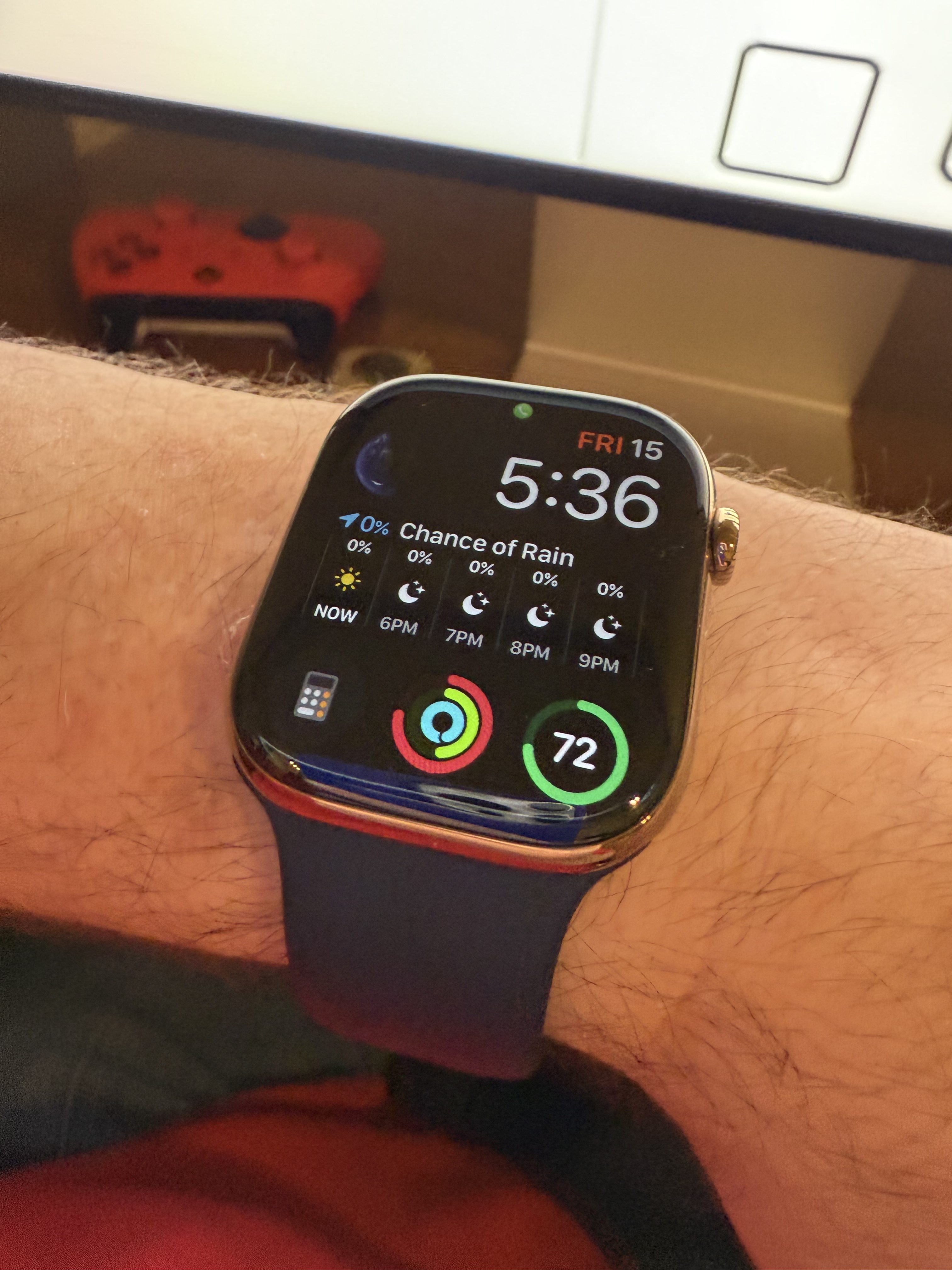 Wrist wearing Apple Watch Series 10 with modular watch face.